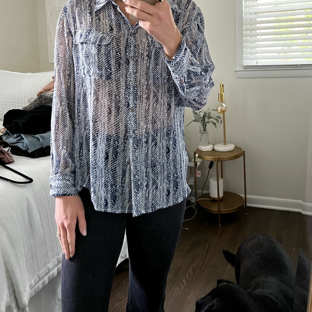 Blue and white patterned blouse